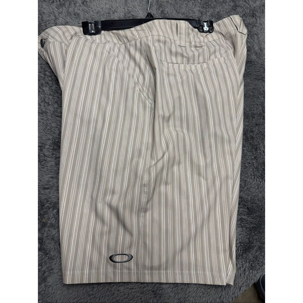 Oakley striped beige white shorts, Size Men’s 38. In great shape!